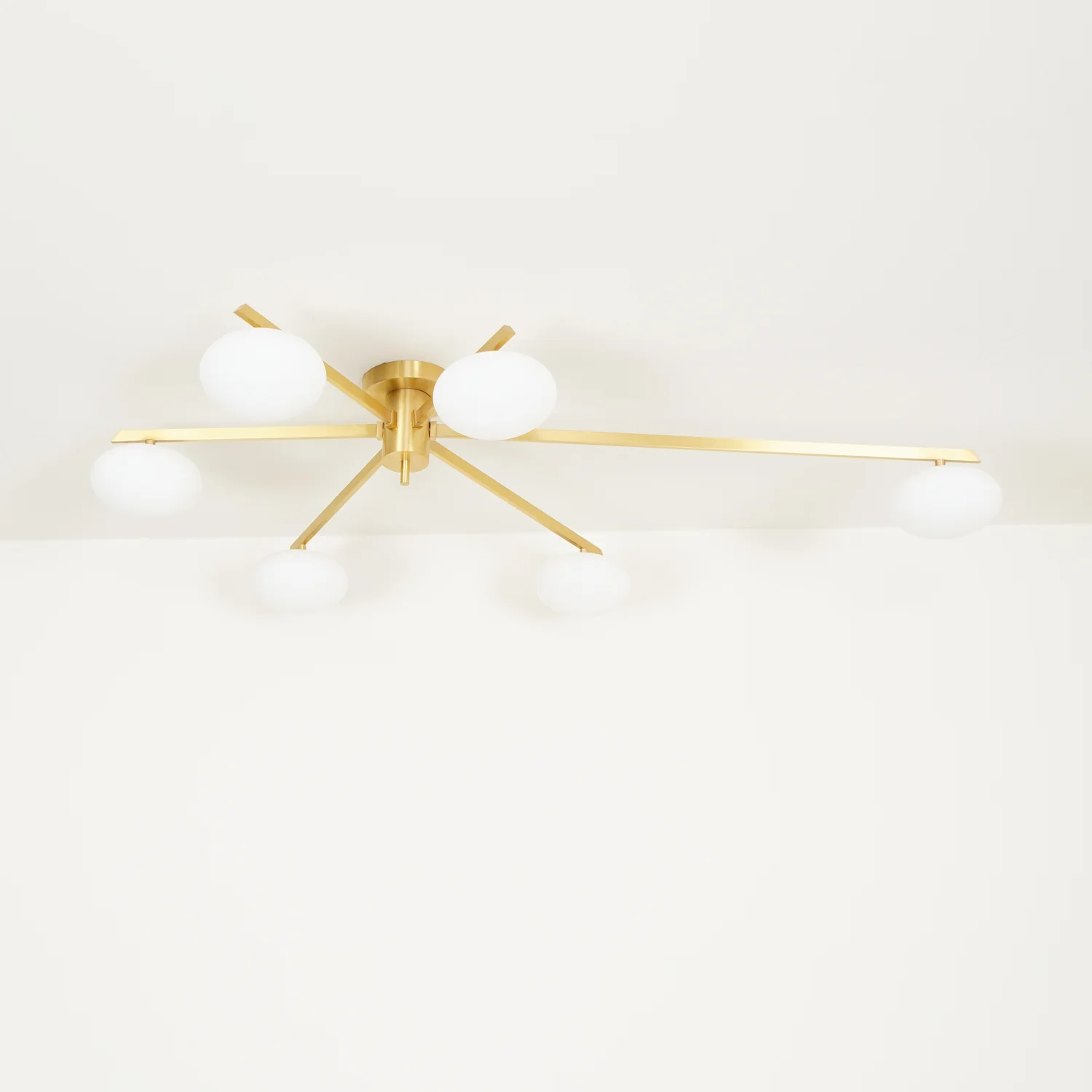 Floating Arm Globe Ceiling Lamp